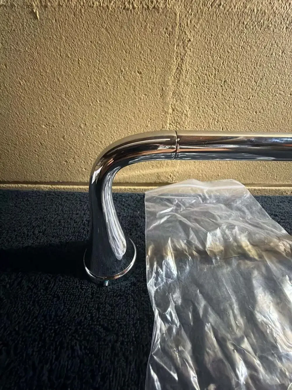 Delta Kayra Pivoting Toilet Paper Holder in Chrome  8”